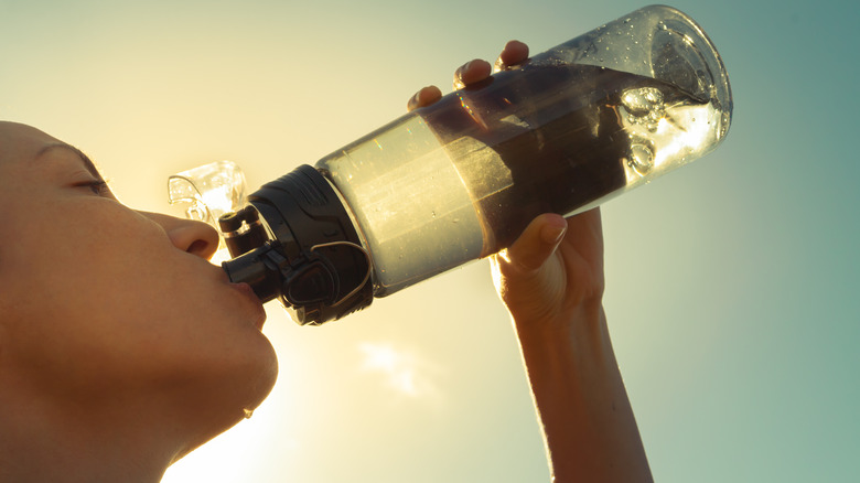 person drinking water