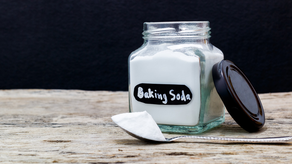 Jar and teaspoon of baking soda