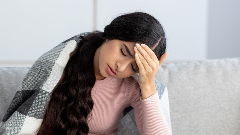 woman with a fasting headache