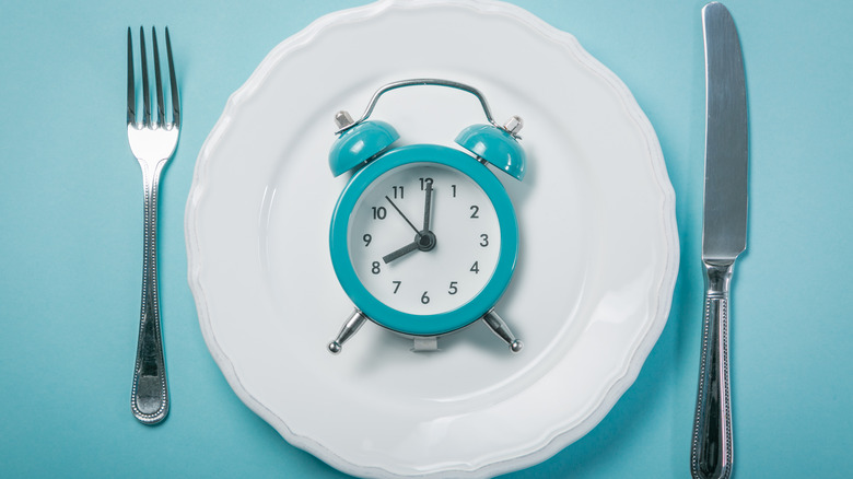 Alarm clock on plate