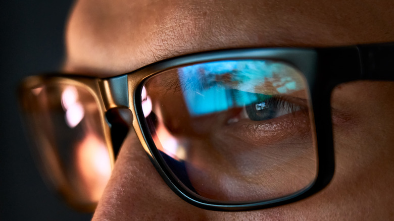 close-up of man wearing glasses