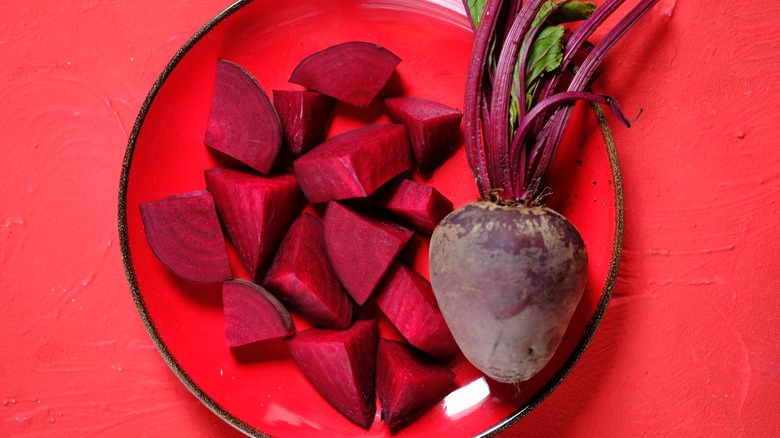 sliced and whole beet on a plate