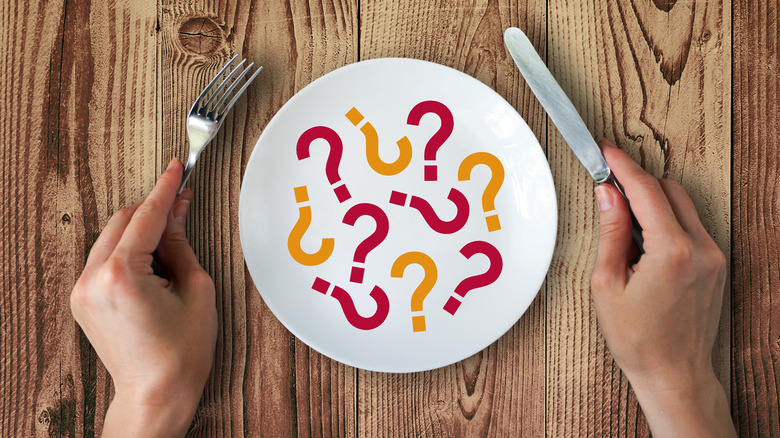 plate with question marks concept