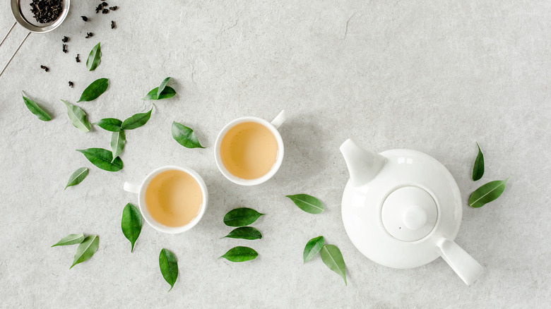 green tea leaves pot