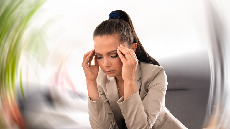 Photo effect illustrating a woman with vertigo