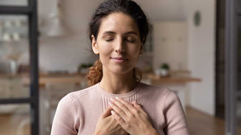 a woman experiencing relief from forgiveness