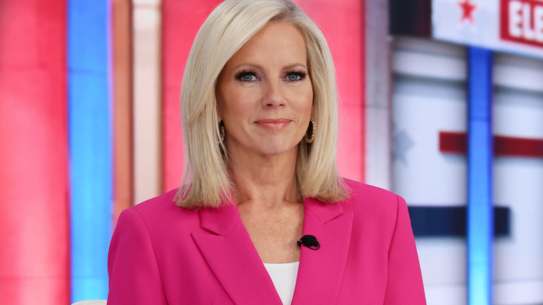 Shannon Bream in a pink suit on the Fox News set