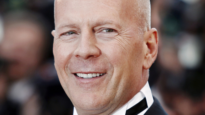 Smiling Bruce Willis at event