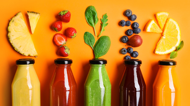 Different kinds of fruit juice in bottles