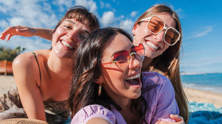 young women smiling in the sun