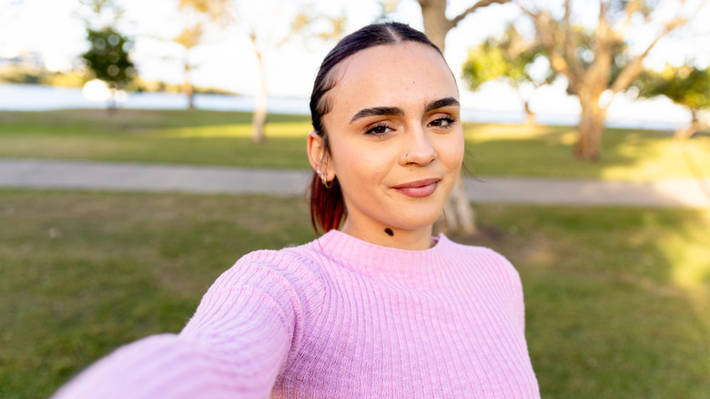 A Gen Z woman taking a selfie