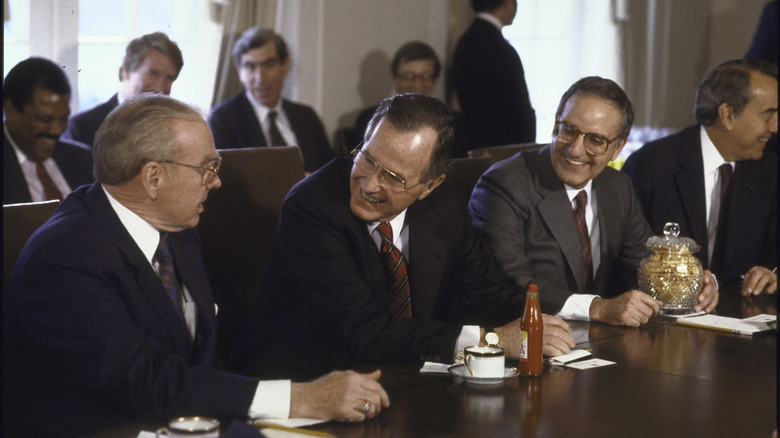 George H.W. Bush being presented with pork rinds and tabasco sauce