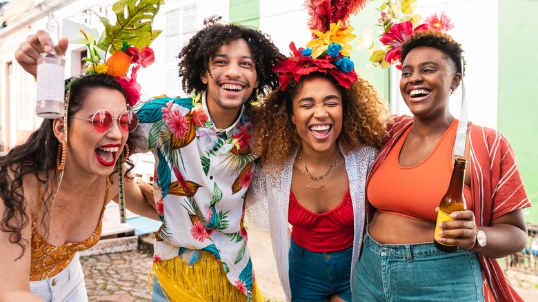 diverse group of people laughing at a carnival