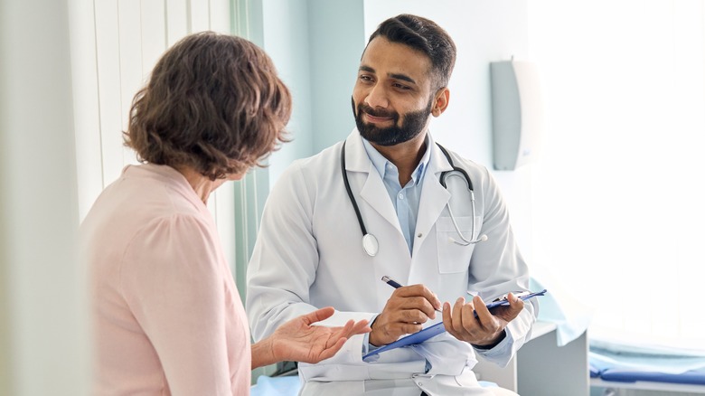 doctor talking to patient