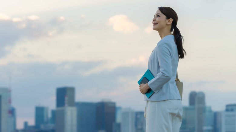woman on top of a building