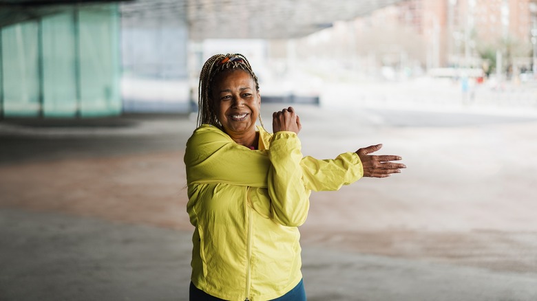 woman stretching during work out routine