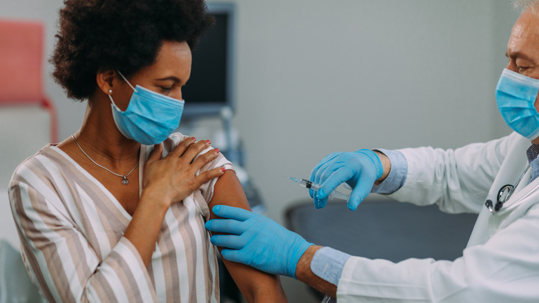 woman getting vaccine