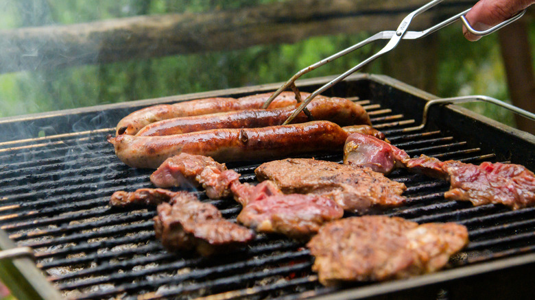 Meat cooking on a grill
