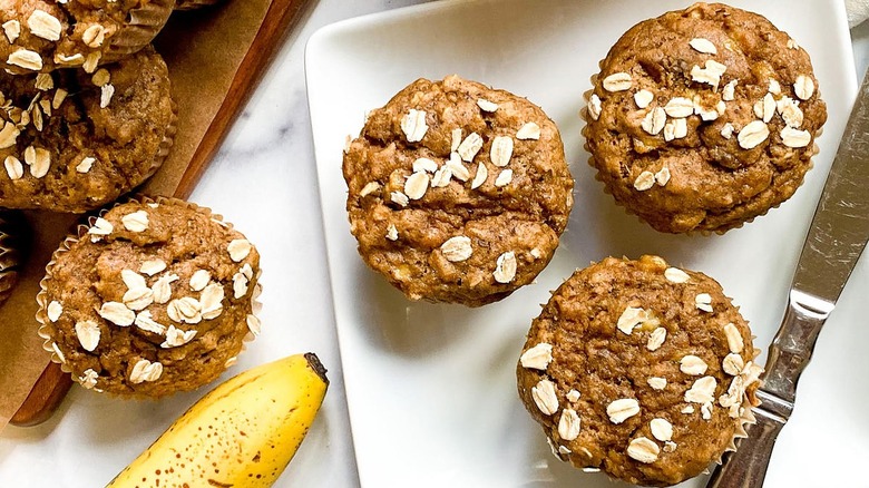 Banana muffins sitting on a white plate