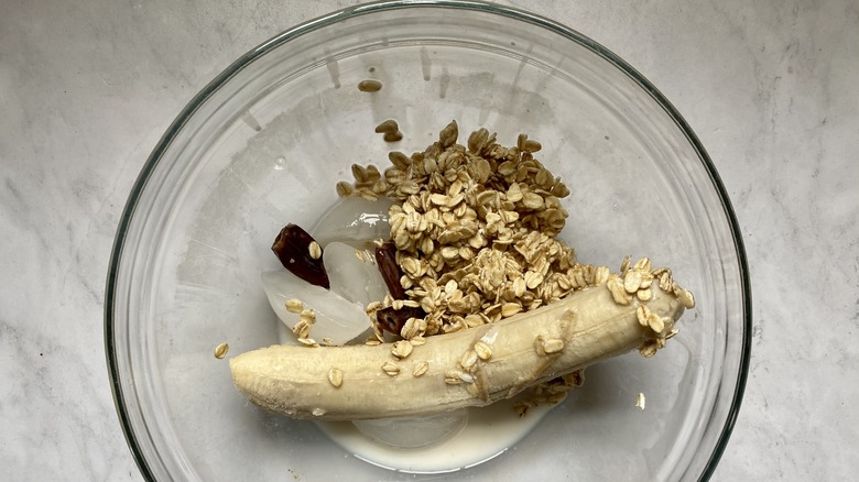 oat smoothie ingredients being blended
