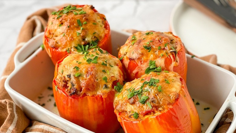 stuffed peppers in baking dish