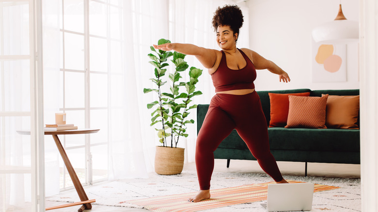 a woman practicing yoga 