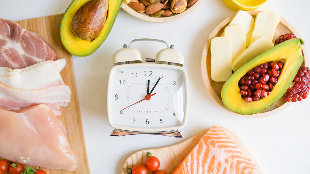 A clock centered around keto-friendly foods