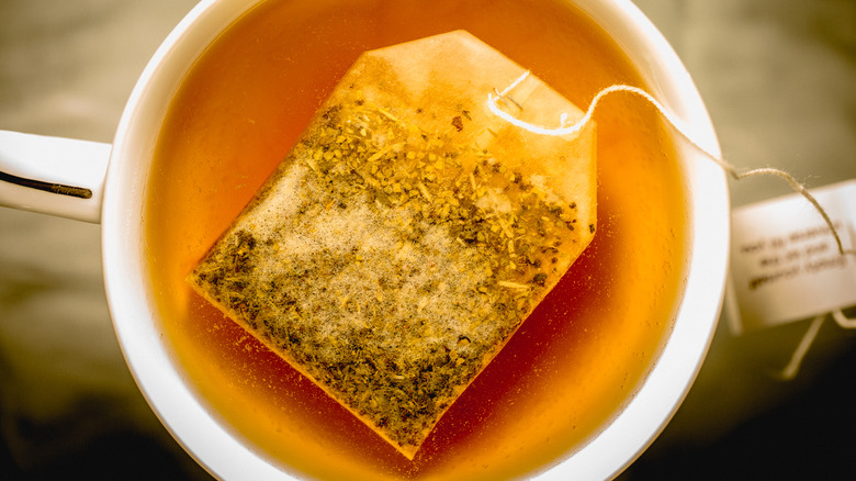 Tea bag in cup of tea