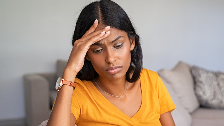Young woman with headache