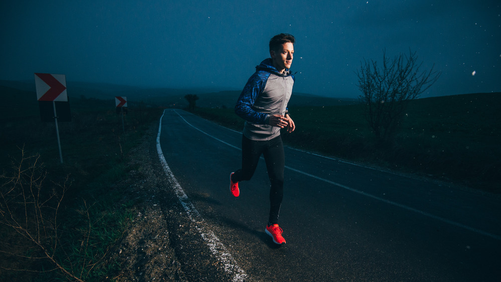 man running at night