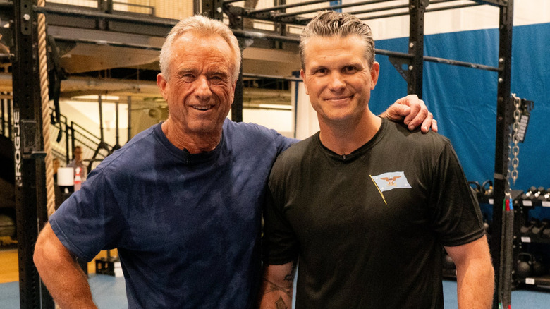 Pete Hegseth and Robert F. Kennedy Jr. wearing workout clothes in a gym