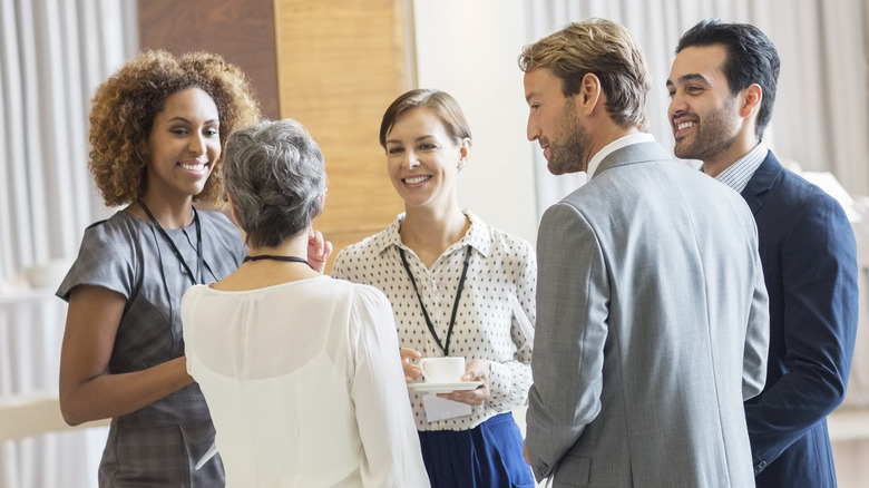 group of people talking 