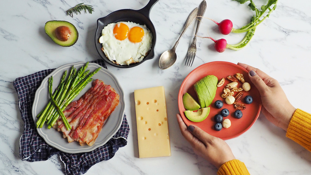 A variation of healthy foods on a white counter top 