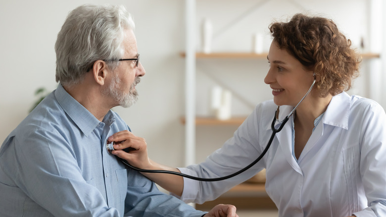 Doctor examining a patient