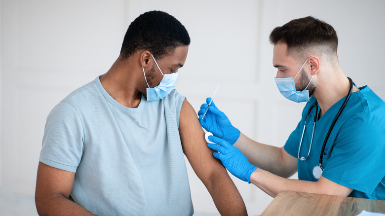 A man gets a vaccine