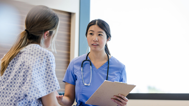 woman talking to her doctor