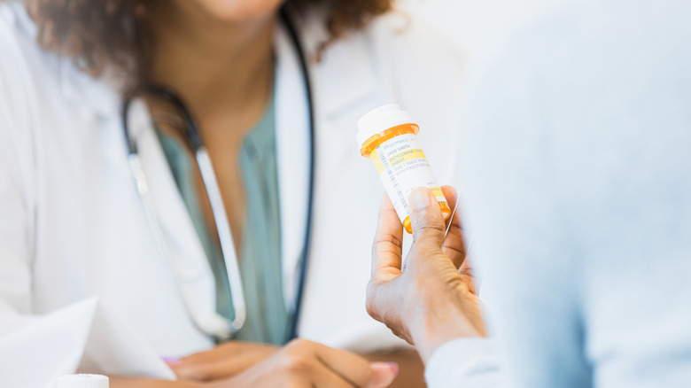 pharmacist speaking with patient