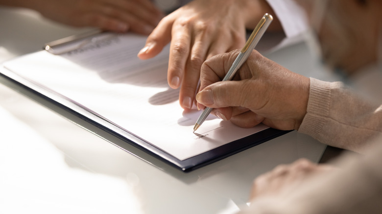 patient filling out pharmacy forms