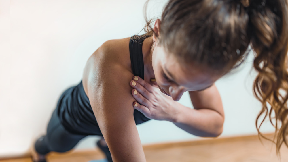 Woman performing plank exercise