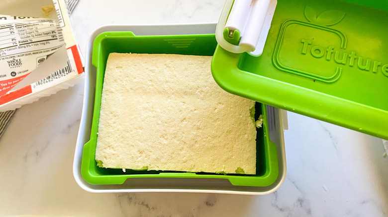 open carton of tofu