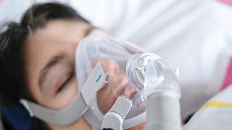 person wearing bipap mask