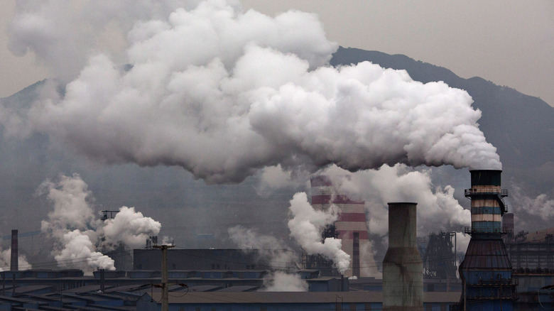 smokestacks releasing pollution into air