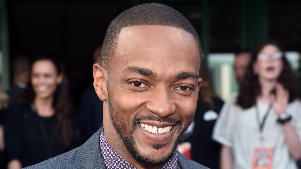 A close up of Anthony Mackie at a Marvel premiere