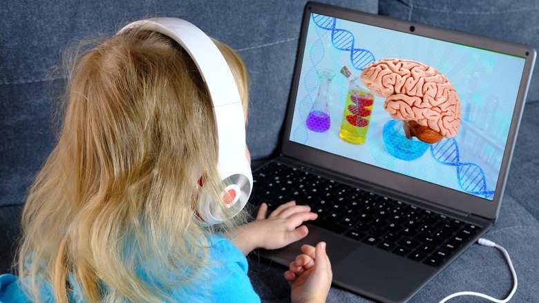 girl on laptop brain