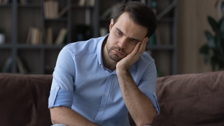 man looking sad and stressed 