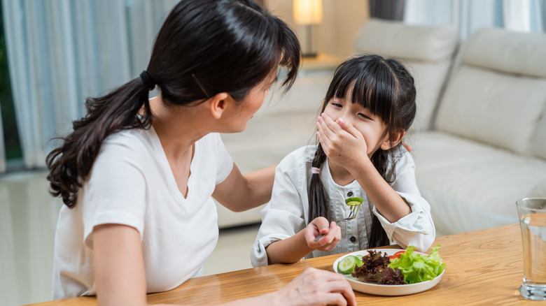 parent and child eating