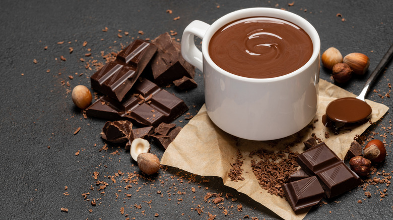 Dark chocolate with mug of hot chocolate