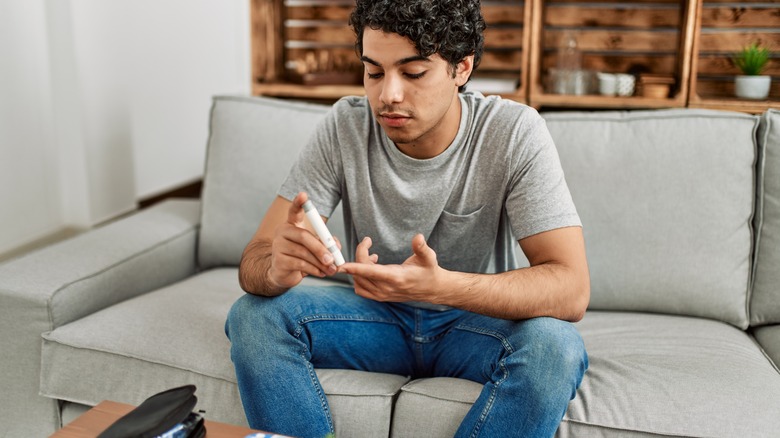 guy with diabetes pen