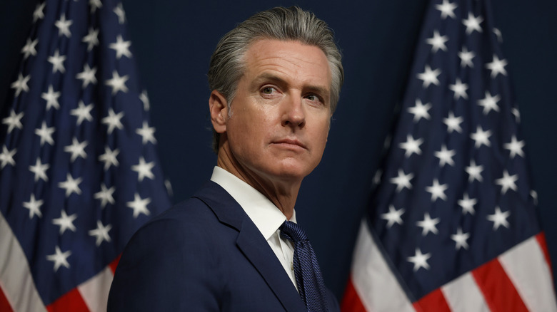 California Gov. Gavin Newsom looking on during a bill signing event