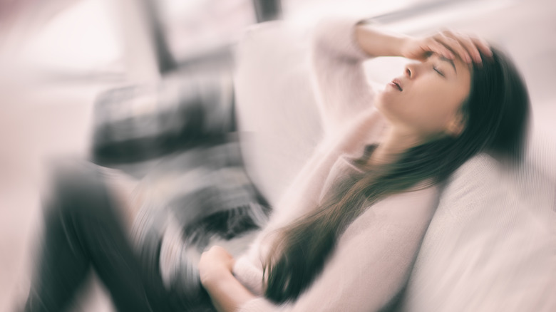 woman suffering motion sickness